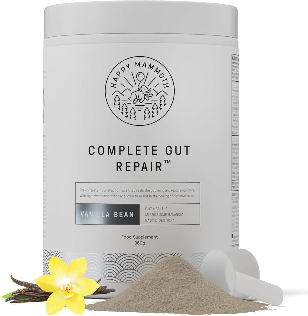 Container of 'Happy Mammoth Complete Gut Repair' with vanilla bean and scoop on a white background